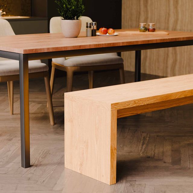Wooden bench with dining table and chairs in a modern interior setting