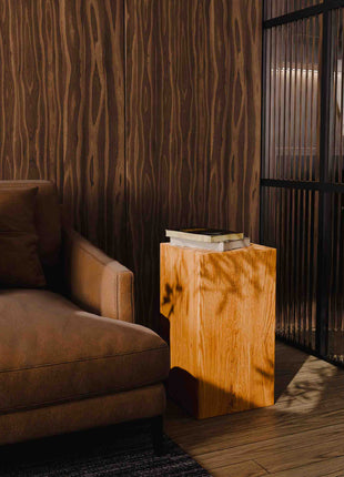 Solid oak end table styled as a small accent table in a cozy living room with neutral decor and soft lighting