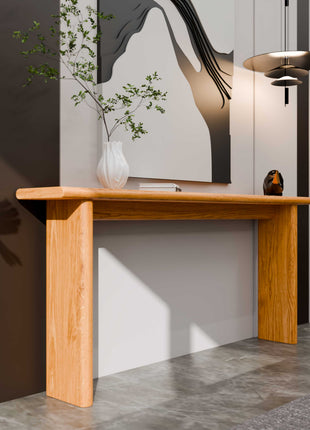 Maple solid wood console table with simple rectangular design, shown in a bright hallway with framed artwork above