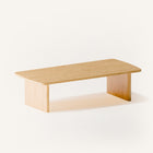 Modern solid wood coffee table close up detail of oak grain and smooth handcrafted edges, highlighting quality hardwood construction