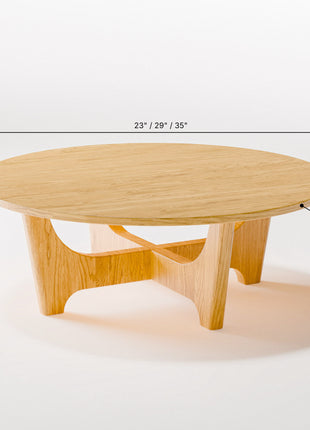 Wooden coffee table with dimensions labeled on a white background