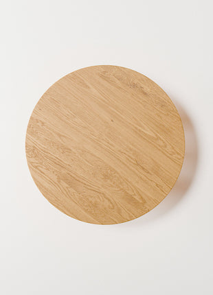 Modern solid wood side table close up detail highlighting visible wood grain and smooth hand finished surface